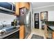 Stainless steel appliances and wood cabinets in kitchen at 921 Northeast Dr, Davidson, NC 28036