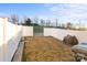 Private backyard with grassy area and grill at 9408 Hamel St, Charlotte, NC 28215