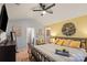 Spacious bedroom with vaulted ceiling, yellow and grey decor, and large bed at 9408 Hamel St, Charlotte, NC 28215