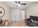 Bright bedroom with double doors and workspace at 9408 Hamel St, Charlotte, NC 28215