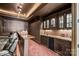 Wet bar area features granite countertops, a beverage fridge and custom lighting at 1024 Adkins Rd, York, SC 29745