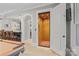 An open elevator showcases a custom wood interior, and is located off of the game room at 1024 Adkins Rd, York, SC 29745
