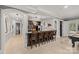 Kitchen bar with seating, stainless steel appliances, and modern fixtures at 1024 Adkins Rd, York, SC 29745
