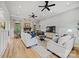 Bright living room with a stone fireplace, hardwood floors, neutral decor, and recessed lighting at 1024 Adkins Rd, York, SC 29745