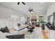 Open living room with a stone fireplace, hardwood floors, neutral decor, and recessed lighting at 1024 Adkins Rd, York, SC 29745