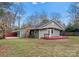 House backyard with deck and fenced yard at 106 Wexford Ct, Charlotte, NC 28210