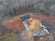 Aerial view of two new construction homes on a wooded lot at 122 Stockbridge Ln, Statesville, NC 28625
