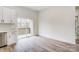 Dining area with sliding glass doors leading to a balcony providing lots of natural light at 122 Stockbridge Ln, Statesville, NC 28625