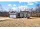 Beautiful single-story house boasts an attached garage and a well-manicured lawn at 122 Stockbridge Ln, Statesville, NC 28625