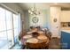 Dining room with wooden table and access to backyard at 138 Lanyard Dr # B, Mooresville, NC 28117
