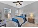 Spacious bedroom with a ceiling fan and plenty of natural light at 15044 New Amsterdam Ln, Charlotte, NC 28204