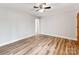 Bright bedroom with wood floors and ceiling fan at 205 Mae Rd, Salisbury, NC 28146