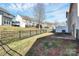 Private backyard with fenced area and patio at 2442 Royal York Ave, Charlotte, NC 28210