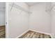 Walk-in closet with wire shelving provides ample storage space at 2442 Royal York Ave, Charlotte, NC 28210