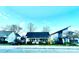 Charming single story home featuring a symmetrical facade, covered porch, and well-maintained landscaping in a residential neighborhood at 2824 N Brevard St, Charlotte, NC 28205