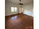Spacious living room with hardwood floors, fireplace, and good natural light at 2824 N Brevard St, Charlotte, NC 28205