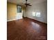 Bright living room with hardwood floors, fireplace, and ample natural light at 2824 N Brevard St, Charlotte, NC 28205