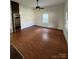 Living room featuring hardwood floors and natural light at 2824 N Brevard St, Charlotte, NC 28205