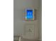 Honeywell Home thermostat set to 77 degrees and a wall switch at 2824 N Brevard St, Charlotte, NC 28205