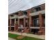 Brick townhouses with balconies and front porches at 2824 N Brevard St, Charlotte, NC 28205