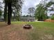 Large backyard with firepit and patio at 3321 Linda Ct, Rock Hill, SC 29732