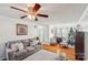 Bright sitting room with hardwood floors and two armchairs at 343 Cottonwood Park Dr, Charlotte, NC 28214