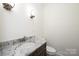 Modern bathroom with granite countertop and updated vanity at 3467 Rock Bridge Dr, Conover, NC 28613
