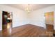 Elegant dining room with hardwood floors and chandelier at 3467 Rock Bridge Dr, Conover, NC 28613
