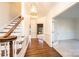 Bright and airy entryway with hardwood floors and staircase at 3467 Rock Bridge Dr, Conover, NC 28613