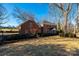 Two-story brick home with landscaping and walkway at 3467 Rock Bridge Dr, Conover, NC 28613