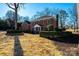 Two-story brick home with mature trees and shrubs at 3467 Rock Bridge Dr, Conover, NC 28613