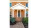Brick front entrance with covered porch and dark door at 3467 Rock Bridge Dr, Conover, NC 28613