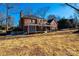 Two-story brick home with large deck and expansive backyard at 3467 Rock Bridge Dr, Conover, NC 28613