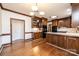 Eat-in kitchen with granite counters and dark wood cabinets at 3467 Rock Bridge Dr, Conover, NC 28613