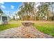 Spacious backyard with fire pit and paver patio at 4003 Grace Pointe Dr # 99, Wesley Chapel, NC 28079