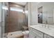 Bathroom with a glass shower, a sink with stone countertop, and neutral-colored walls at 4003 Grace Pointe Dr # 99, Wesley Chapel, NC 28079