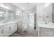 Elegant bathroom with double vanity, marble shower, and soaking tub at 4003 Grace Pointe Dr # 99, Wesley Chapel, NC 28079