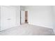 Spacious bedroom with double doors leading to closet and access to another room at 4003 Grace Pointe Dr # 99, Wesley Chapel, NC 28079