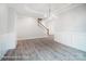 Spacious dining room with hardwood floors and staircase view at 4003 Grace Pointe Dr # 99, Wesley Chapel, NC 28079