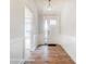 Bright entryway with wood-look floors and white wainscoting at 4003 Grace Pointe Dr # 99, Wesley Chapel, NC 28079
