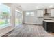 Bright kitchen with sliding doors leading to backyard at 4003 Grace Pointe Dr # 99, Wesley Chapel, NC 28079