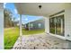Relaxing patio with sliding glass door access and backyard views at 4003 Grace Pointe Dr # 99, Wesley Chapel, NC 28079