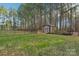 Large backyard with storage shed and privacy fence at 416 Zelkova St, York, SC 29745