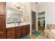Bathroom featuring double vanity, shower, and walk-in closet at 416 Zelkova St, York, SC 29745