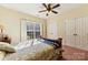 Bedroom with double doors and ceiling fan at 416 Zelkova St, York, SC 29745