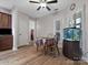 Breakfast nook features an aquarium, ceiling fan, and a table with two chairs at 416 Zelkova St, York, SC 29745