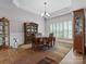Traditional dining room featuring hardwood floors, an area rug, and elegant wood furniture at 416 Zelkova St, York, SC 29745