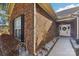 Brick home's front entrance with walkway and landscaping at 416 Zelkova St, York, SC 29745