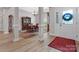 Elegant foyer with hardwood floors, decorative columns, and a view into the dining area, perfect for welcoming guests at 416 Zelkova St, York, SC 29745