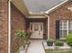 Charming front door with sidelights and decorative wreath at 416 Zelkova St, York, SC 29745